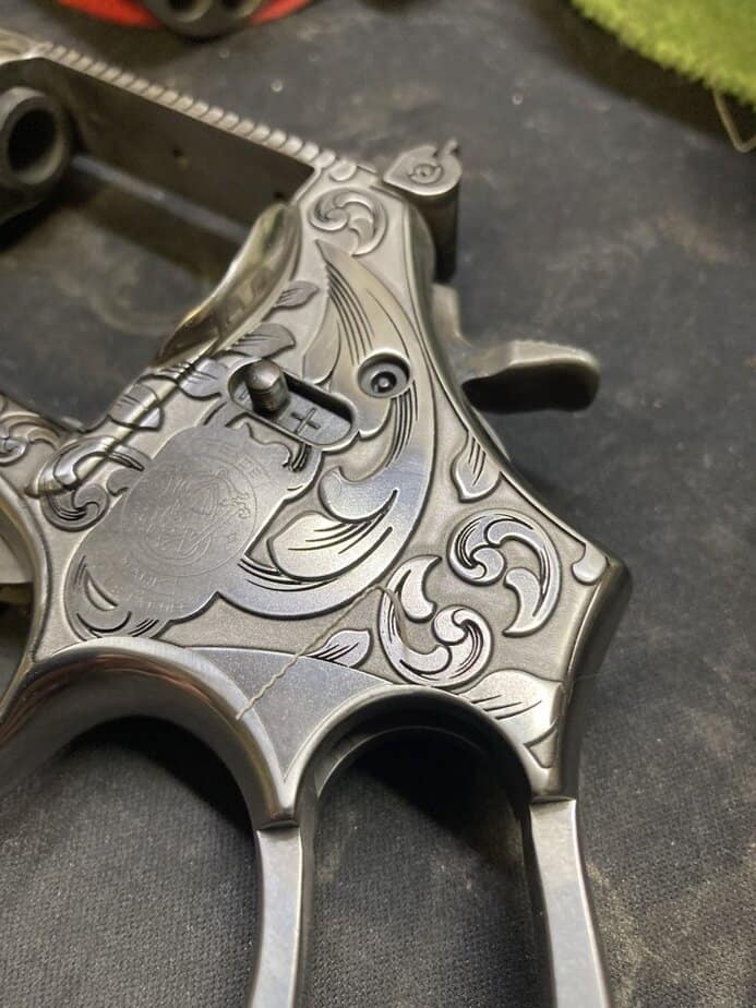 Deep laser engraved revolver