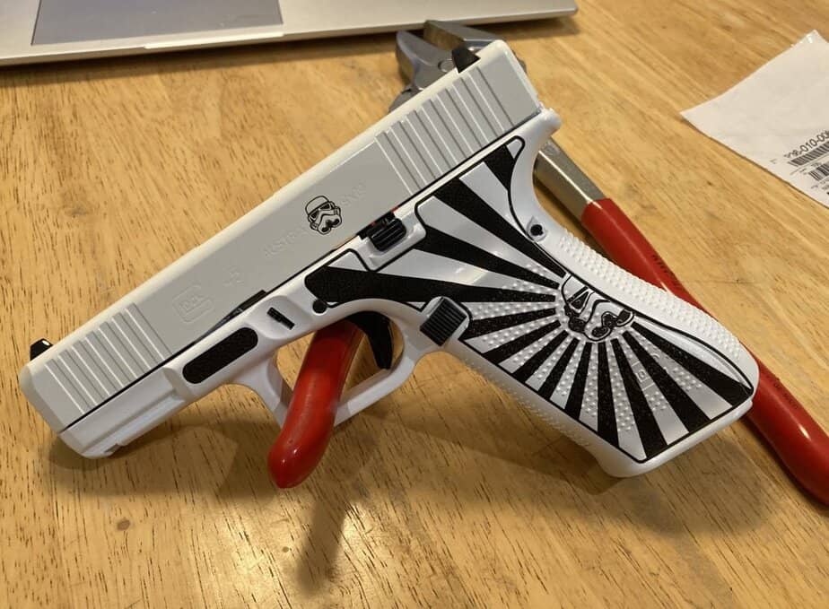 White duracoat with stormtrooper stippled Glock 45 frame